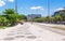 View Barra da Tijuca with palms and mosaic of sidewalk in Rio de Janeiro