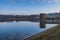 A view from the barrage of reflections along the shoreline of Pitsford Reservoir, UK