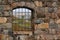 View through the barred window of an old railway turntable at Riksgransen in Sweden