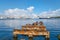 View of the Bay of Havana and The Bay of Havana and the Old Havana skyline with a rusty iron pier on the foregroundthe Old Havana