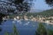 View of the bay with houses and boats of the island of Lopud, Croatia panorama, among the trees