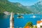 View of the Bay of Kotor with two small islands and a bell tower in Perast, Montenegro