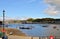 The view on a bay with a lot of boats on the river Conwy during a low tide. Conwy, Wales / United Kingdom