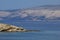 View of the bay, mountains and pebble beaches