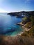 View of the bay of Paxos with yachts and the sun