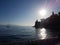 View of the bay of Paxos with yachts and the sun