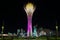 View the Bayterek monument and observation tower at night in Astana, Kazakhstan.