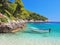 View from the beach of a boat on the sea