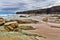 View of the beach of Cathedrals in summer cloudy day, an outflow