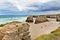 View of the beach of Cathedrals in summer cloudy day, an outflow