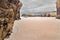 View of the beach of Cathedrals in summer cloudy day, an outflow