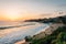 View of beach and cliffs at sunset, from Heisler Park, in Laguna Beach, Orange County, California