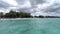 View of a beach and crystal clear waters on a sunny day, Mauritius