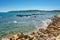 View of the beach Du Ponteil of the town Antibes.with the Cap d `Antibes peninsula in the background