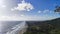 view of the beach and hills from the paragliding