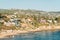 View of beach, houses and hills from Crescent Bay Point Park, in Laguna Beach, Orange County, California
