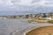 View of the beach huts and beach at Mudeford Sandbank, Dorset, England, UK