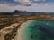 View of beach with its beautiful white sand, and crystal clear turquoise water, Sardinia, Italy.