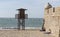 View of the beach lifeguard tower, Castle of San Sebastian in th