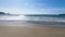 View of the beach next to the Tessalated Pavement in Eaglehack Neck in the Tasman Peninsula in Tasmania with the ocean glimmering