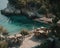 A view of a beach with tables and chairs. AI generative image.