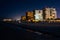 View of beachfront hotels and the beach from the fishing pier at