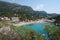 View of a beautiful Agios Spyridon bay and beach in Palaiokastritsa with crystal turquoise sea water, Corfu
