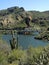 A view of beautiful Apache Lake in Arizona with a small bridge in the frame. pier.