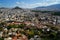 View of beautiful Athens cityscape from Acropolis seeing building architecture, Mount Lycabettus, mountain, blue sky and cloud