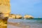 View on beautiful cliffs in Algarve. Beach Careanosy in Portimao. Vacation in Portugal