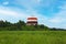 View of a beautiful domed structure in greenery