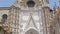 View of the beautiful facade and architecture of the Cathedral of Seville.