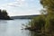 View of a beautiful forest lake designed for fishing, in the midst of lush greenery, in the territory of a natural national park