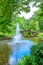 View of beautiful garden with fountain