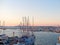 View of the beautiful harbor and boats in Alghero, Sardinia, Italy.