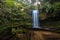 View on beautiful Koropuku falls in middle of deep magical native forest