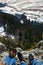 View of the beautiful mountain landscape through legs of touris