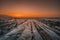 View of the beautiful orange sunset on the flysch of the Sakoneta beach