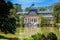 View of the beautiful Palacio de Cristal a conservatory located in El Retiro Park built in 1887 in