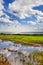 A view of a beautiful sea view in Ayia Thekla in Agia Napa, Cyprus.Reflections, a sky full of clouds