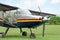 View of beautiful ultralight airplane in field on autumn day