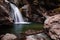 View of a beautiful waterfall in the forest. Bingham Falls Stowe USA.