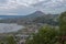 View behind Batur volcano on caldera with lake and opposite Abang mountain. Lake with thermal springs. Natural phenomenon.