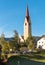 View of the bell tower of the Parish Church of Saints Ingenuino and Albuino  in Monguelfo-Tesido, province of Bolzano, South Tyrol