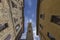 View of the bell tower of Volterra through the streets of the city