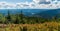 View bellow Lysa hora hill summit in Moravskoslezske Beskydy mountains with Sance water reservoir and hills