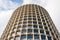 View from below of a cylindrical office skyscraper