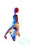 View from below. Dynamic portrait of athlete in basketball gear preparing to shoot against white studio background in