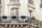 View from below on a facade European building with balconies in Paris