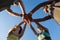 View from below of a group of sporty people in a huddle